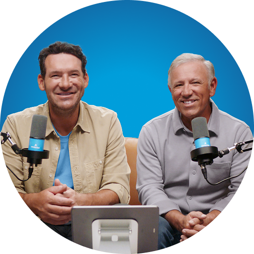 Image of Tony Romo and his father Ramiro in a podcast-style setting
